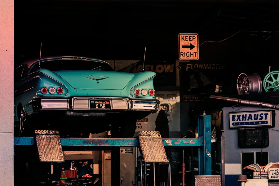 Vintage Chevrolet on a Car Lift in a Garage