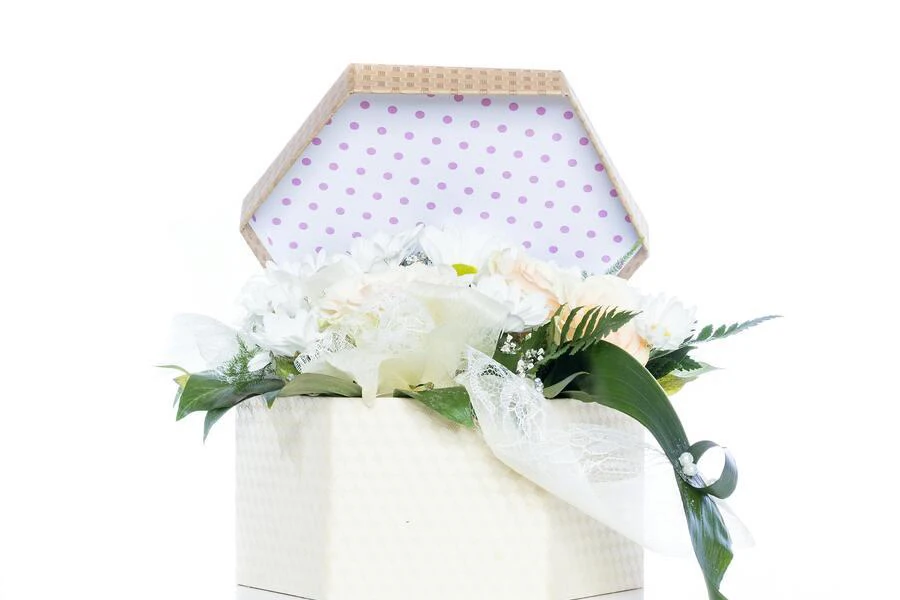 White roses in a white gift box