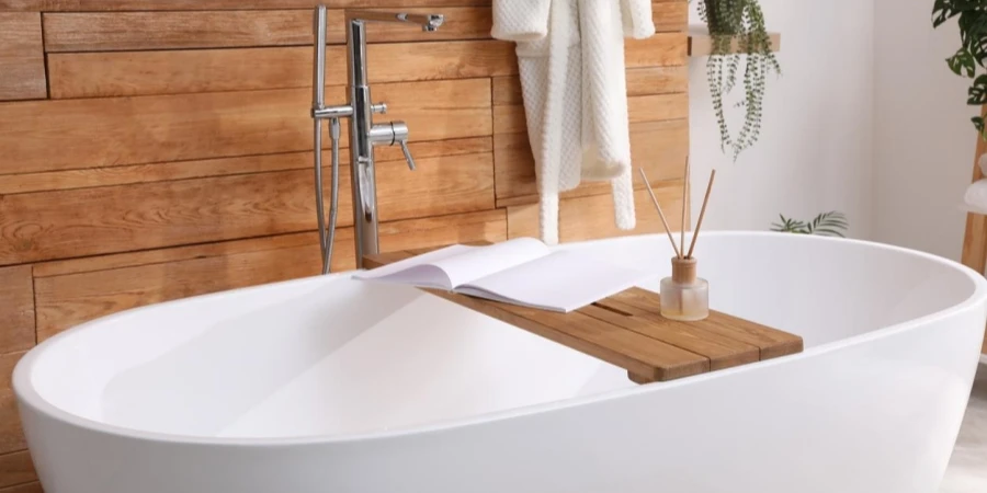 White tub and beautiful plants in bathroom, Interior design