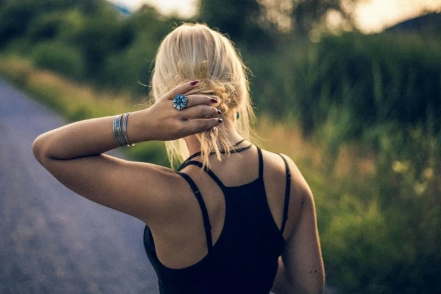 Woman Holding Her Hair Outdoors