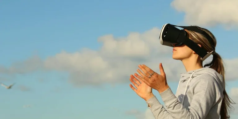 Woman Using Vr Goggles Outdoors