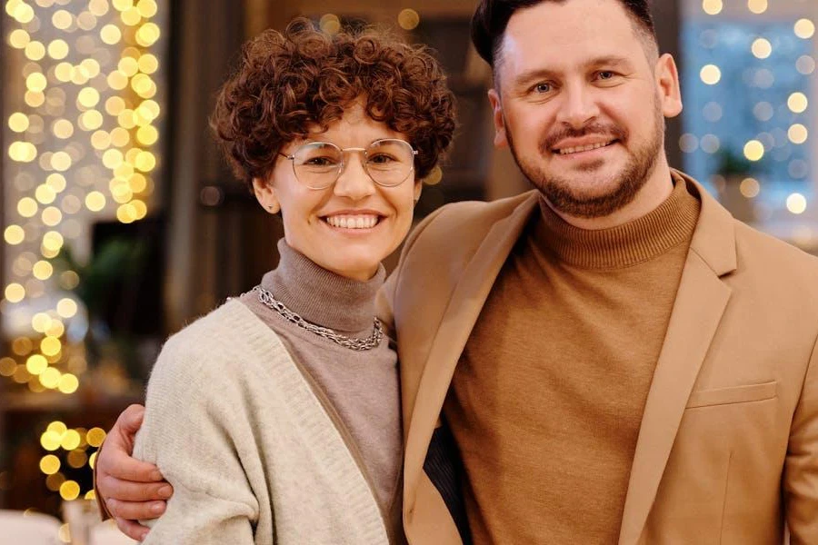 Woman and man in Christmas dinner outfits