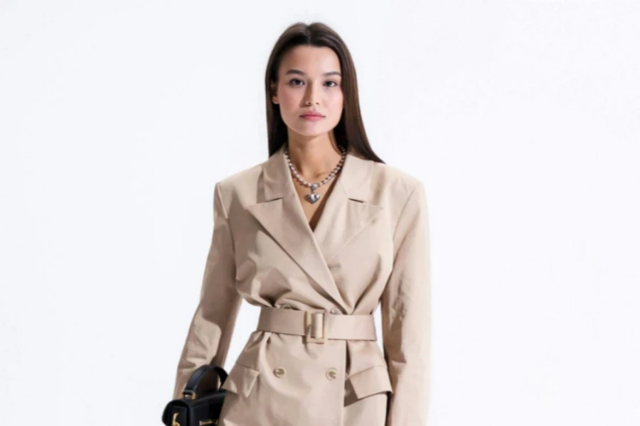 Woman in Trench Coat and with Bag