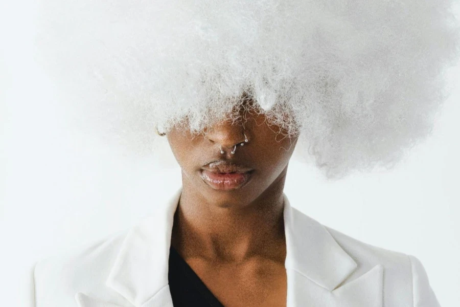 Woman in White Wig in Studio