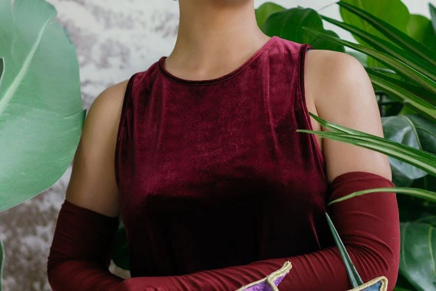 Woman posing in a red velvet dress