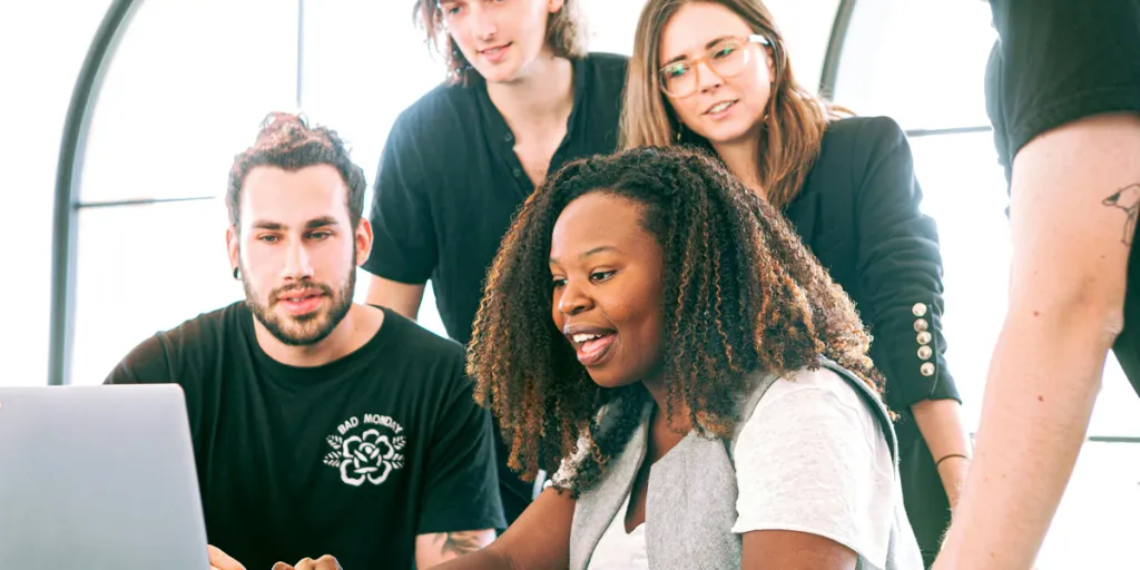 Woman sharing her presentation with her colleagues