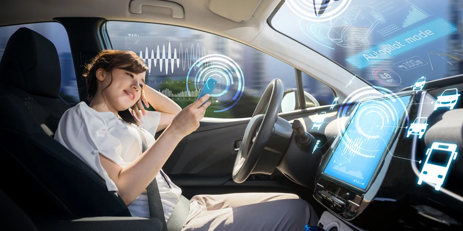Woman using AI in car