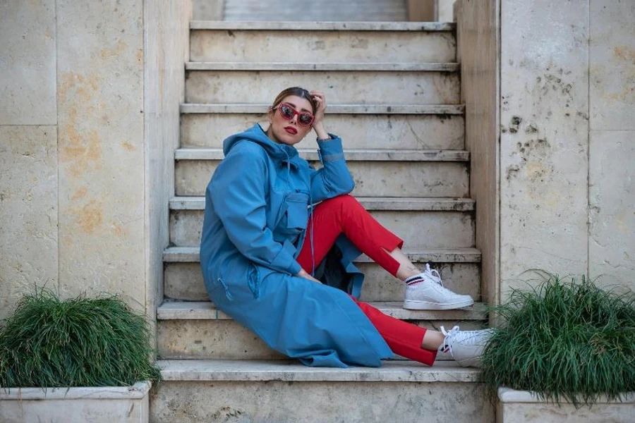 Woman wearing long blue anorak