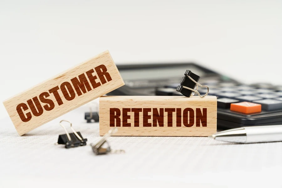 Wooden blocks with “CUSTOMER RETENTION” imprint