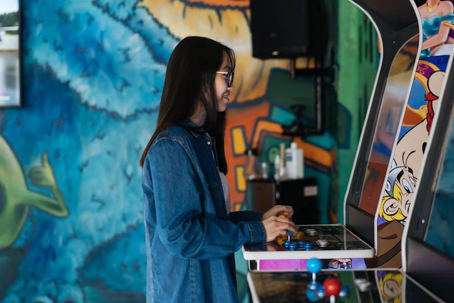 Young lady enjoying a game on a stand-up cabinet