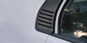 a close up of a car’s side window