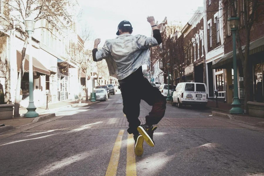 a man wearing sporty clothing and dancing