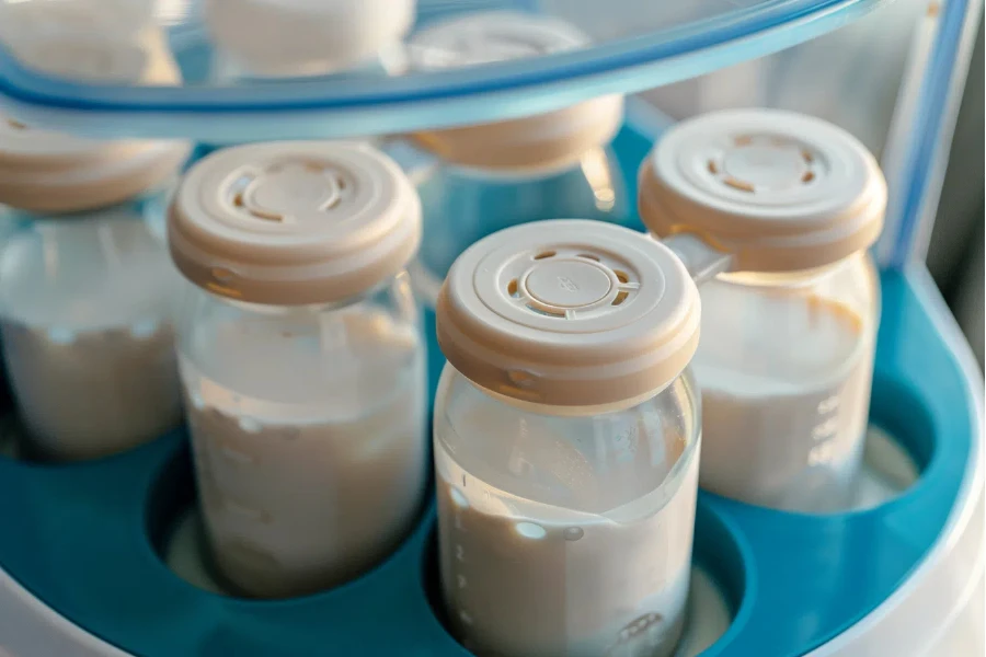 a baby bottle steamer is used to warm the milk in bottles