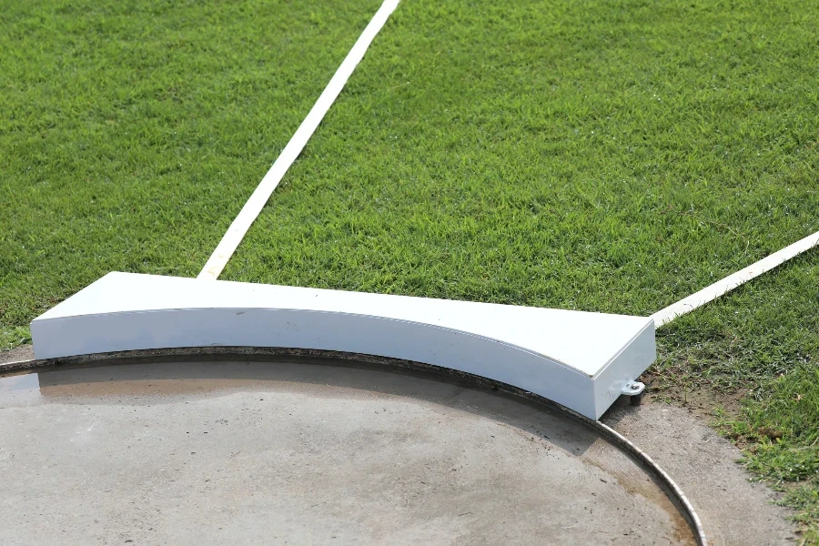 Concrete throwing circle on grass