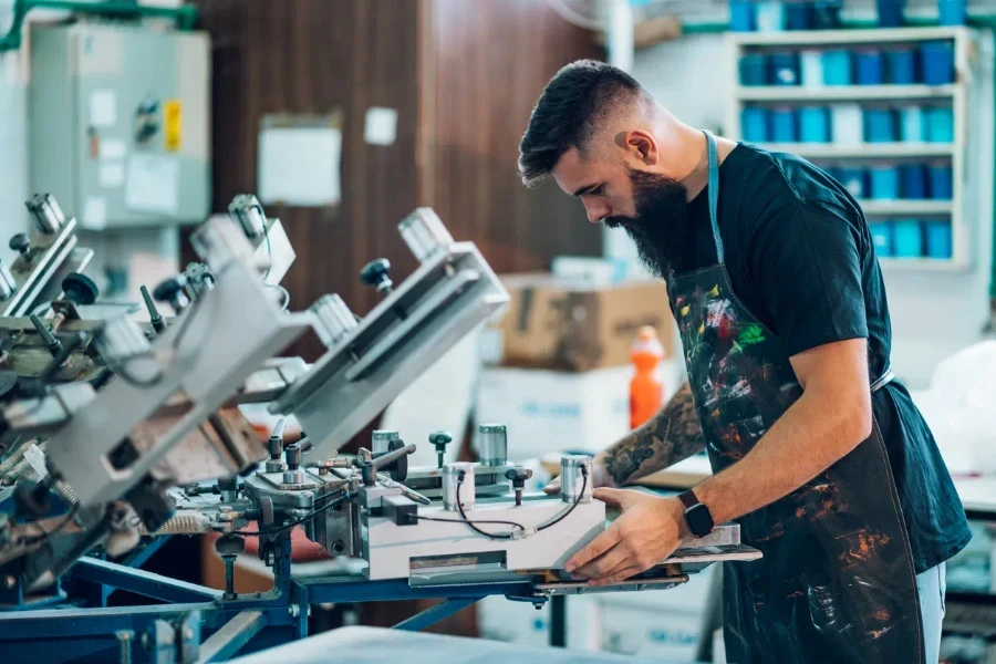 male worker using screen printing film