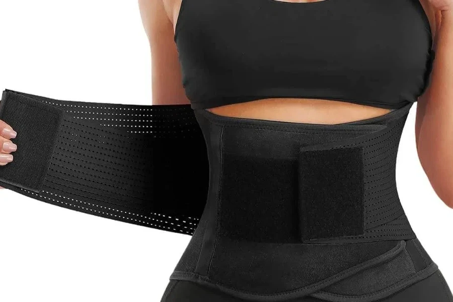 Lady showcasing a waist trimmer