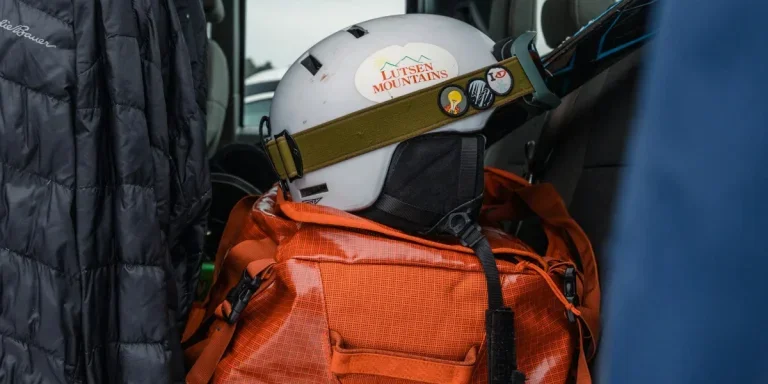 Large orange duffel ski boot bags