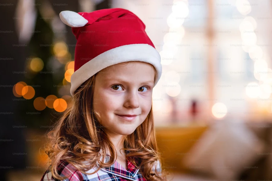 portrait of small girl with santa hat