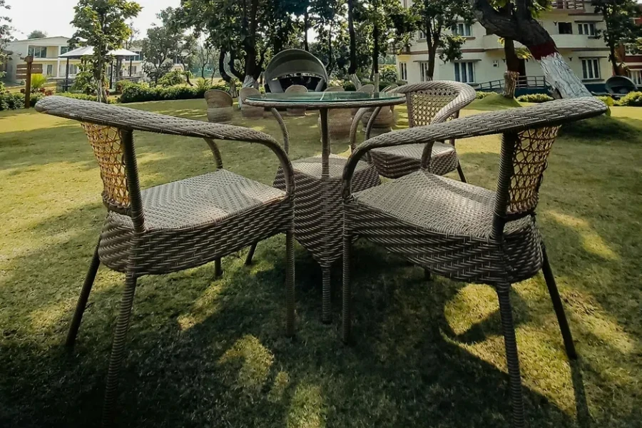 Rattan, metal, and glass outdoor garden set