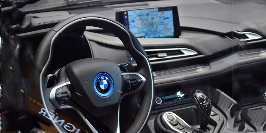 shallow focus photo of black bmw steering wheel