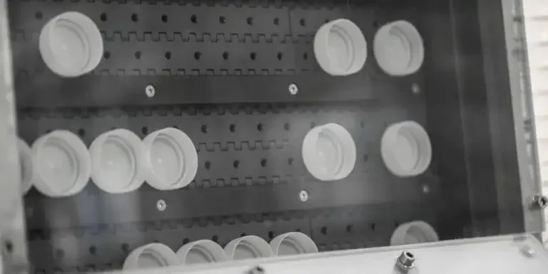 the material is heated and softened in a barrel