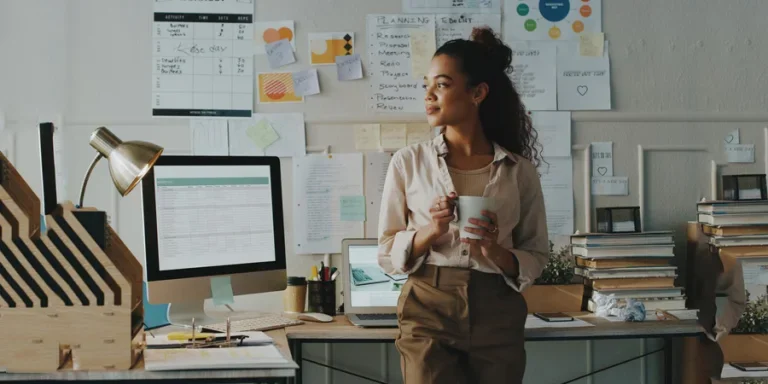 young female solopreneur busy chasing her dreams in her home office