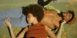 70s outfits worn by a man and a woman