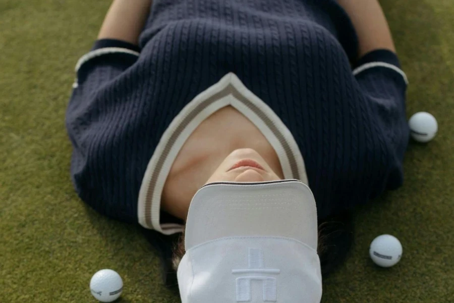 A Woman Golfer Lying on Grass