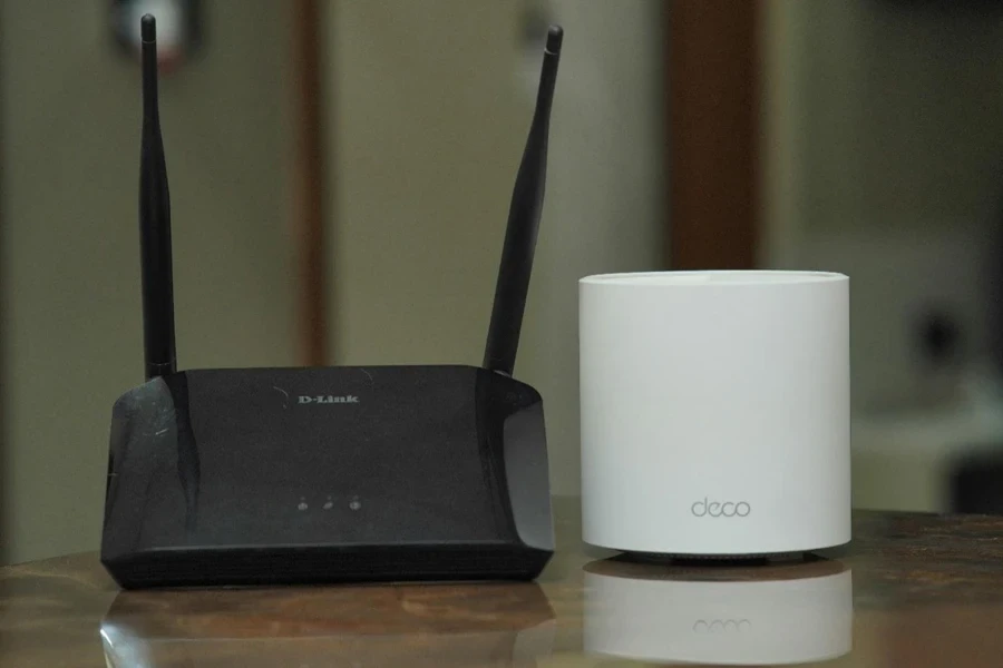 A black router next to a white object