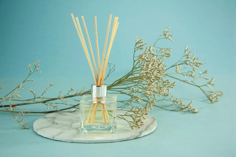 A bottle of reed diffuser with sticks