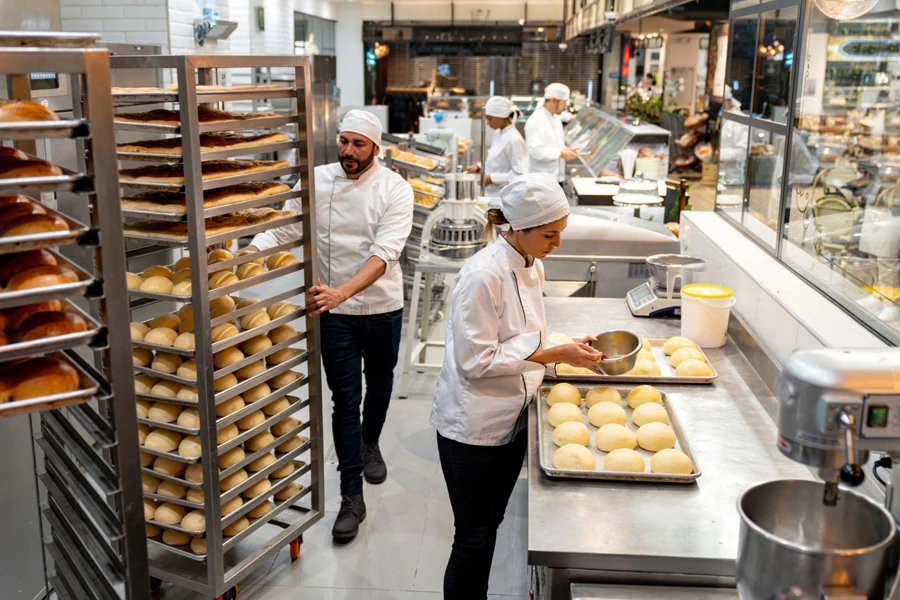 A group of employees baking fresh bread