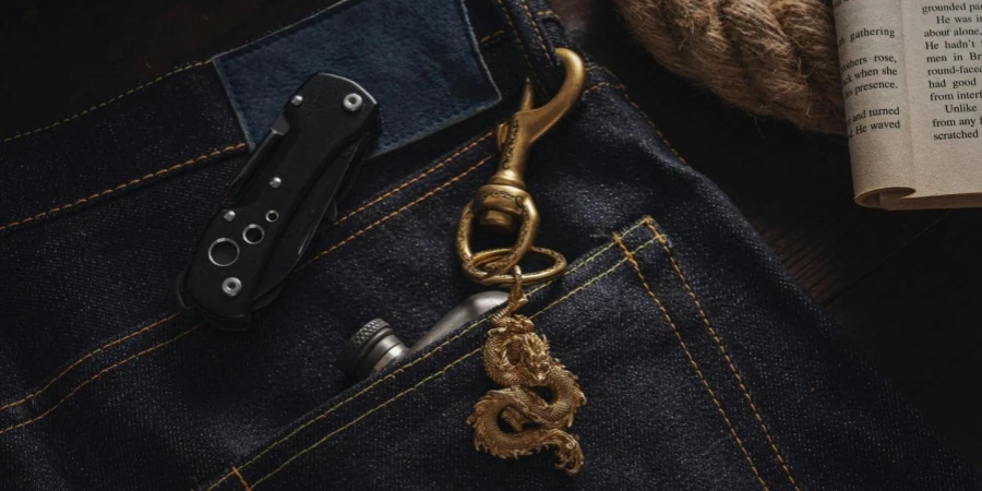 Close-up of a Dragon Pendant Attached to Jeans