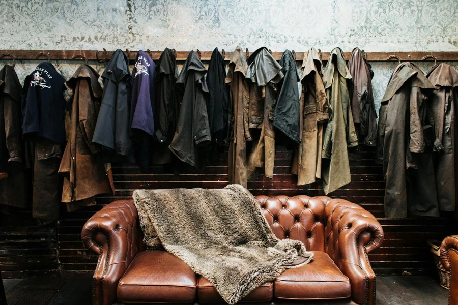 Clothes in retro room with couch