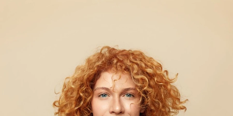 Cropped closeup portrait of redhead ginger haired girl