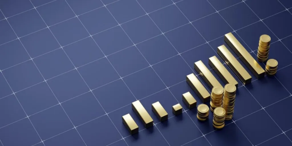 Golden chart and stacks of gold coins