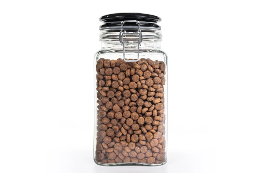 Isolated glass jar with pet food