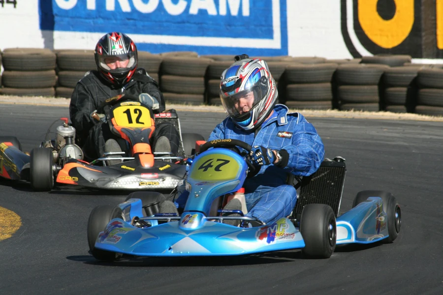 Man Driving a Fast Go Kart