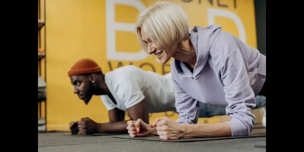 Man and woman doing pushups