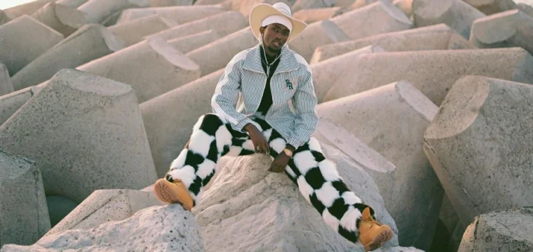 Man in Hat, Shirt and Checkered Trousers