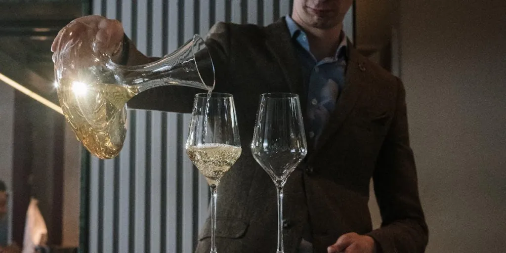 Man pouring wine from decanter