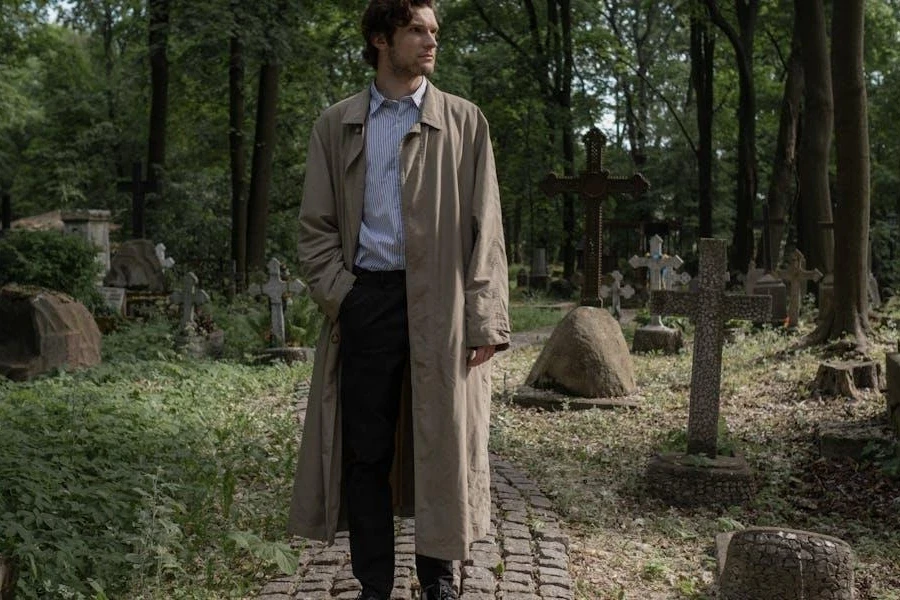 Man standing in a stylish trench coat