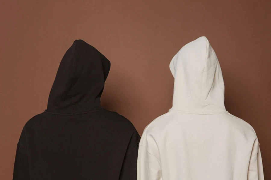 Models and Black and White Hoodies in Studio