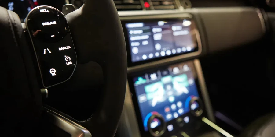 Modern car interior. Shallow DOF. Steering wheel in focus