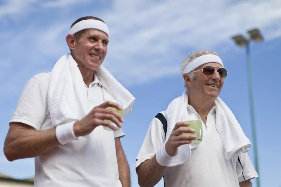 Older men drinking lemonade outdoors