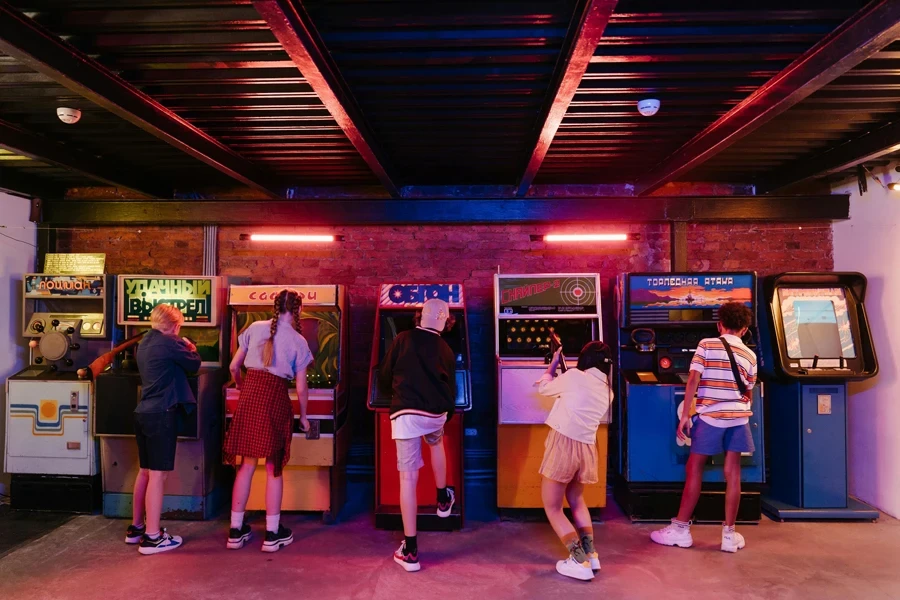 People Standing in Front of Store during Night Time