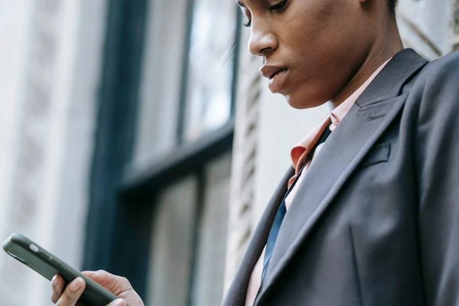 Person checking newsletter on a mobile phone