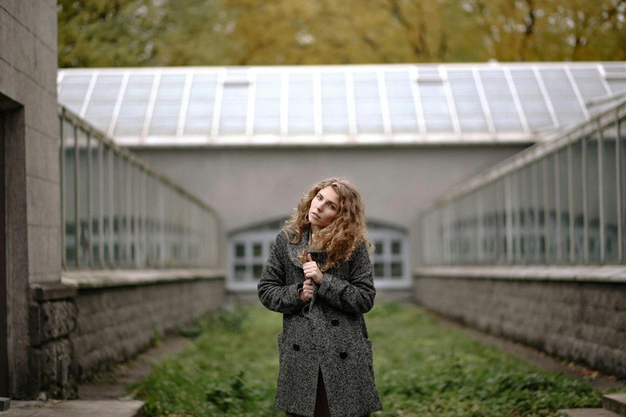 Photo Of Woman Wearing Grey Coat