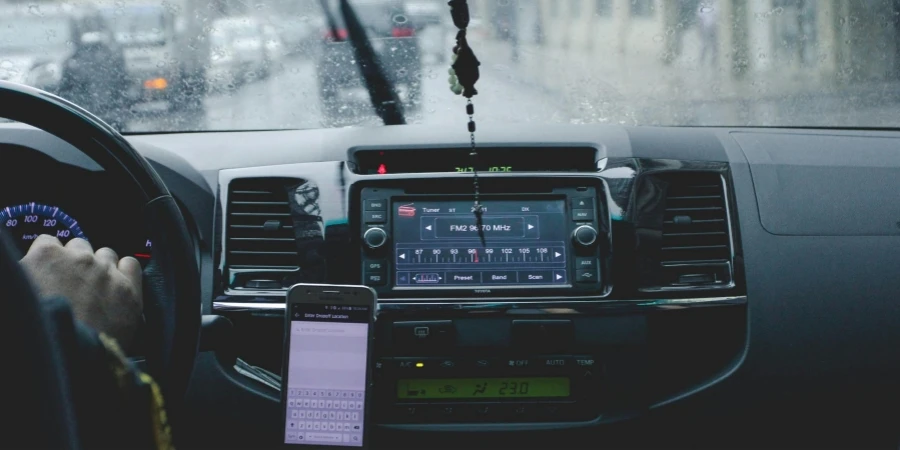 Photo of Person Driving Car While Raining