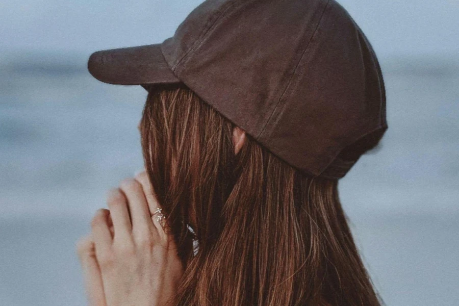 Shallow Focus Photo of Woman Wearing Striped Long Sleeves