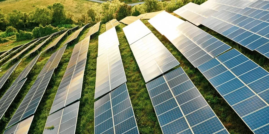 Solar panels fields on the green hills